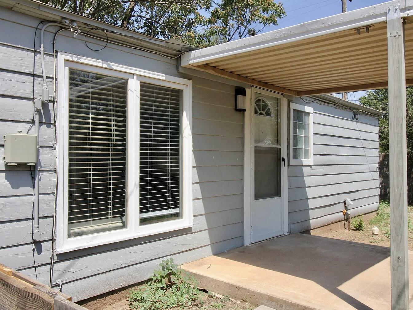2216 30th Street, Unit REAR Lubbock, TX 79411 - Photo 2 of 14 a view of house with a large window