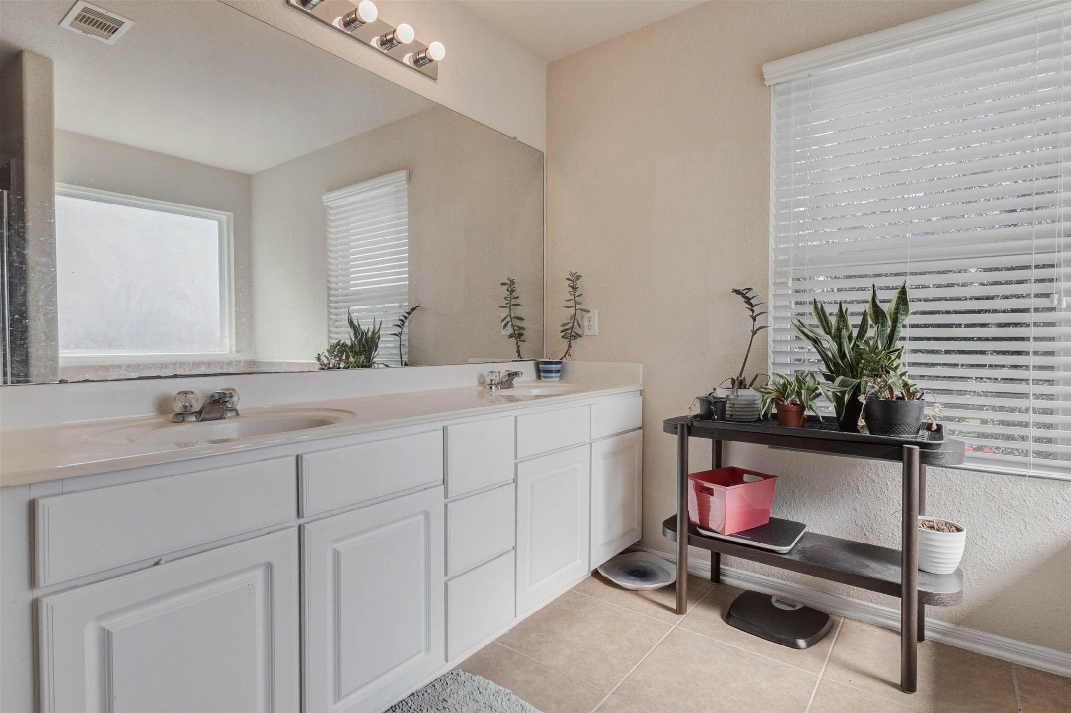 3027 Upland Spring Trace Katy, TX 77493 - Photo 18 of 29 a bathroom with a sink and a mirror