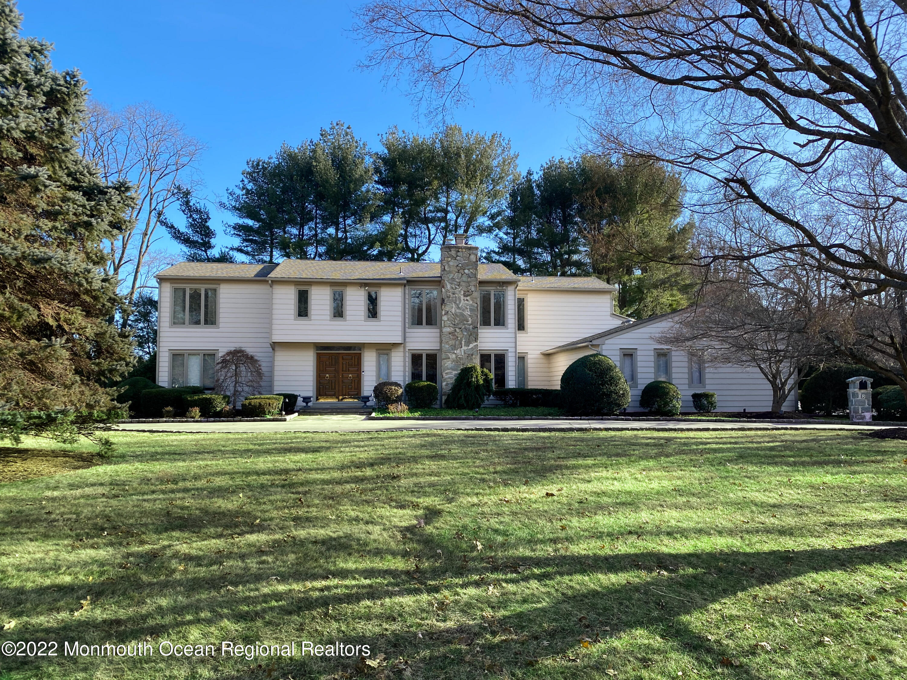 2 Woods End Road Rumson, NJ 07760 - Photo 1 of 35 a front view of house with yard and trees
