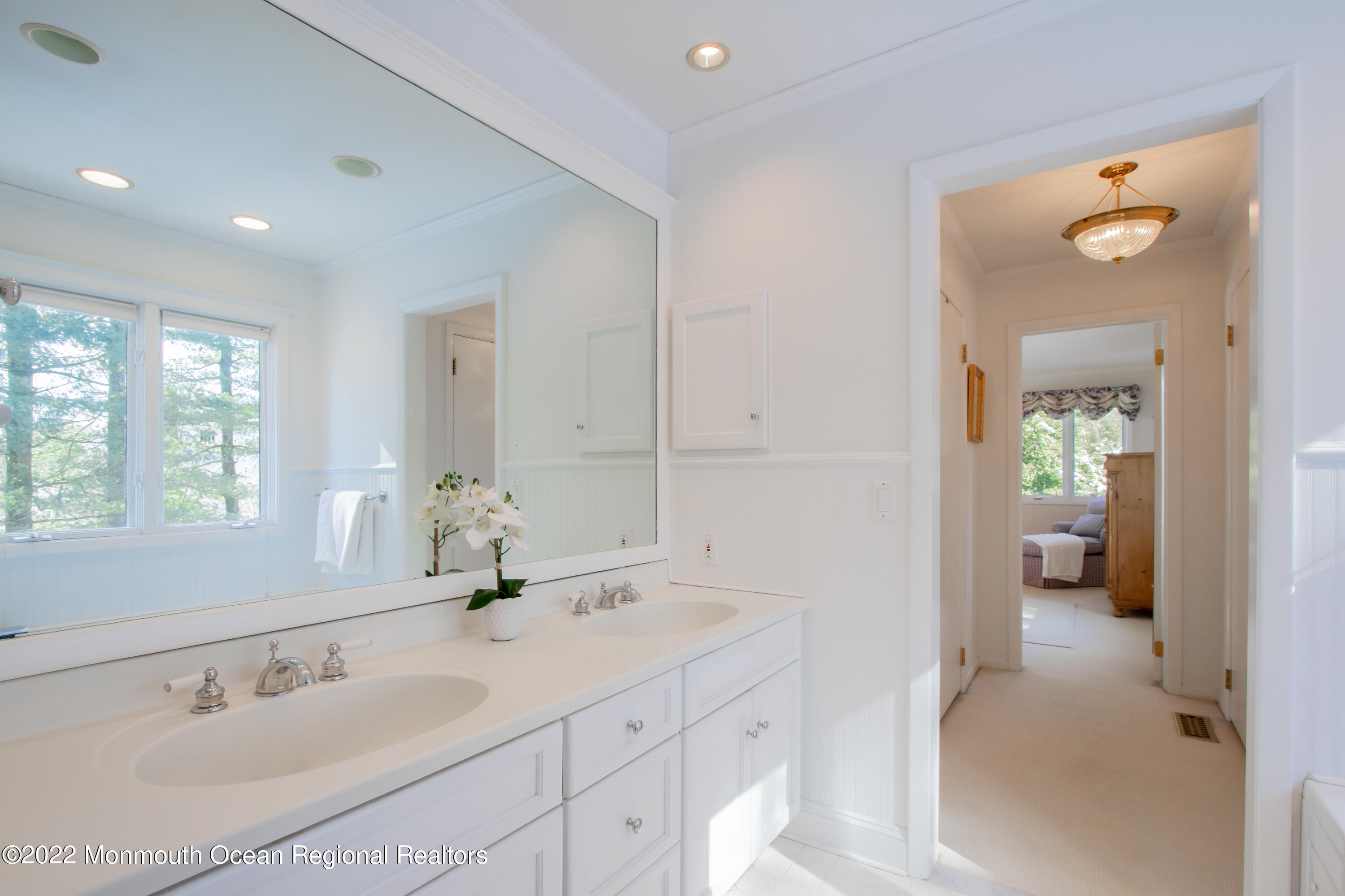 2 Woods End Road Rumson, NJ 07760 - Photo 11 of 35 a en suite bathroom with a sink and a mirror