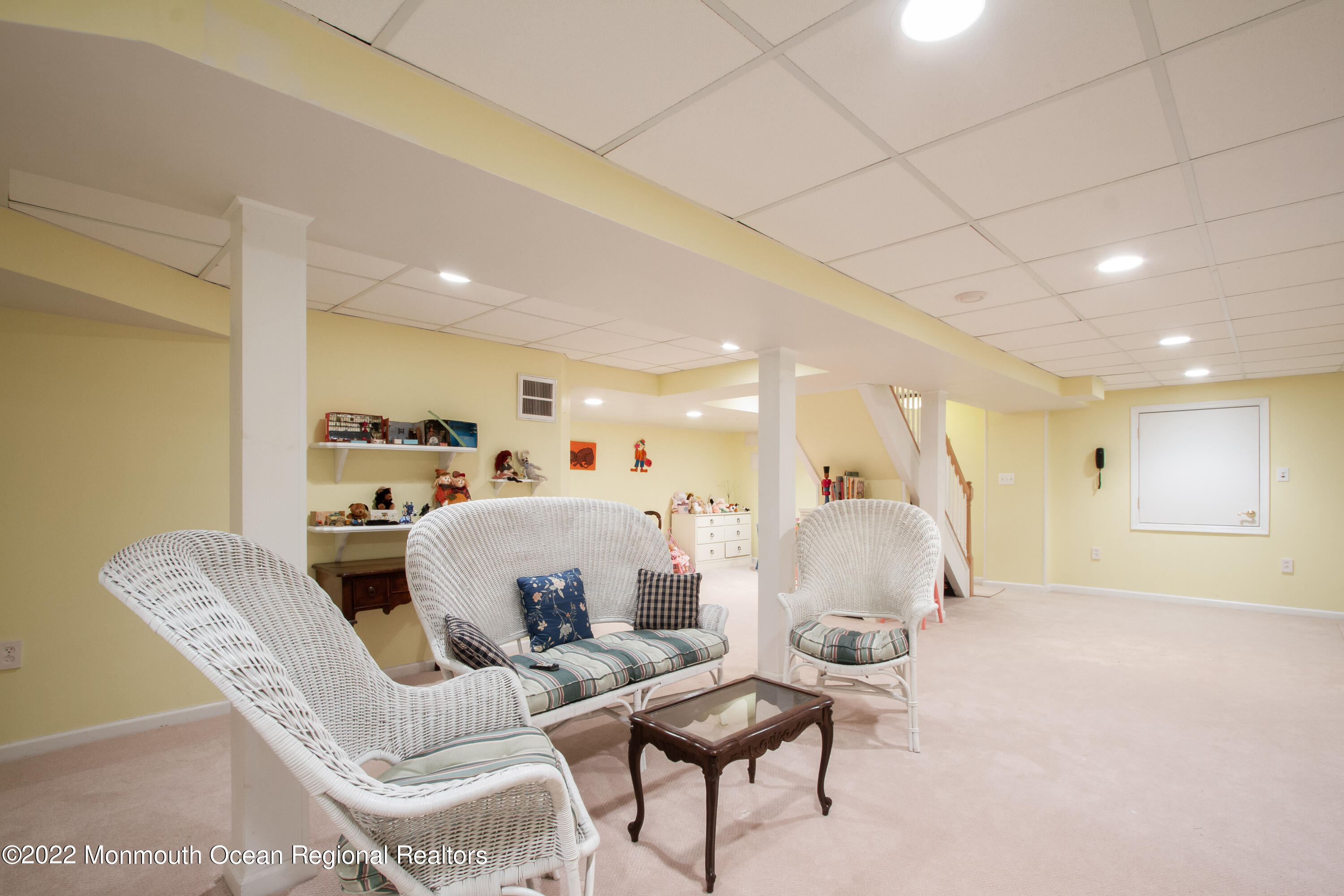 2 Woods End Road Rumson, NJ 07760 - Photo 27 of 35 a living room with furniture and a dining table with kitchen view