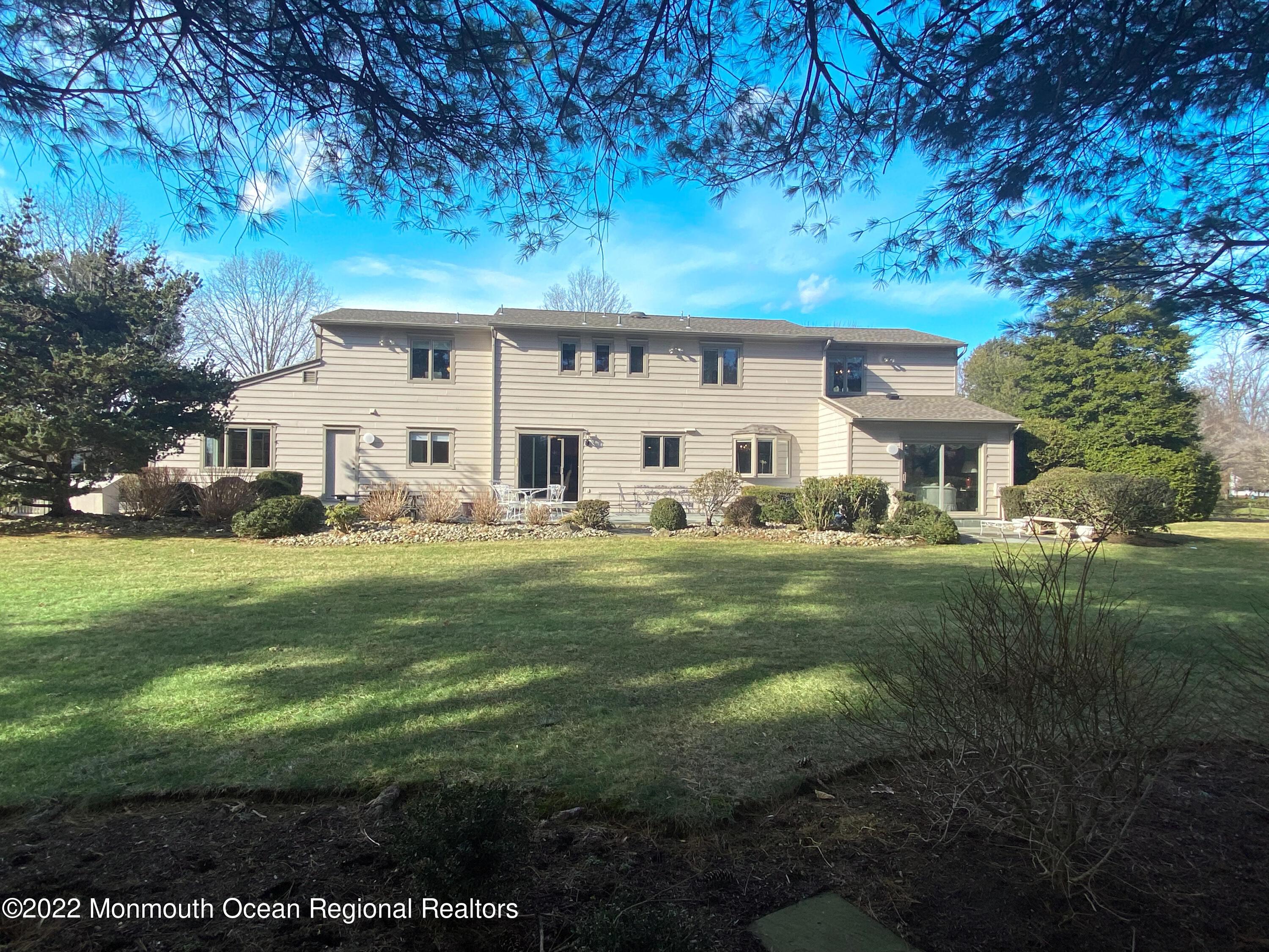 2 Woods End Road Rumson, NJ 07760 - Photo 35 of 35 a front view of a house with garden