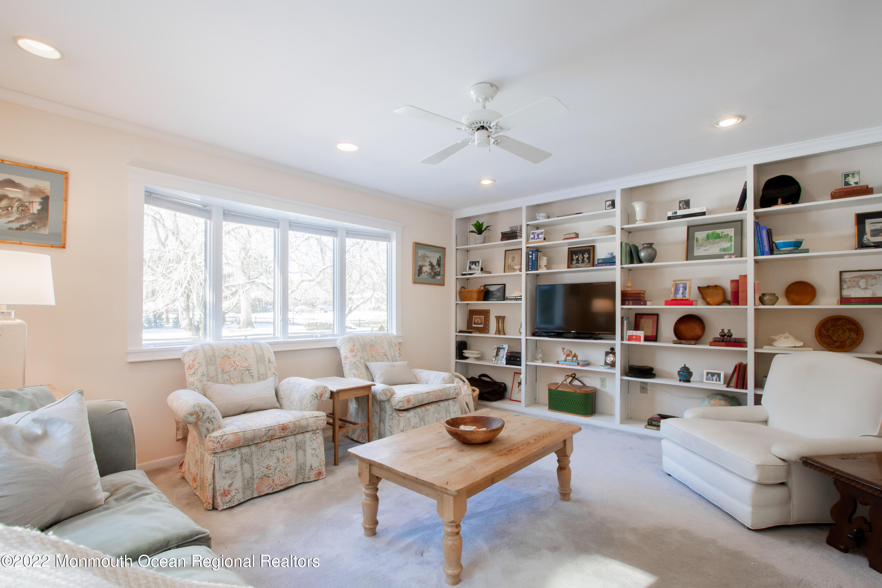 2 Woods End Road Rumson, NJ 07760 - Photo 5 of 35 a living room with furniture a rug and a flat screen tv