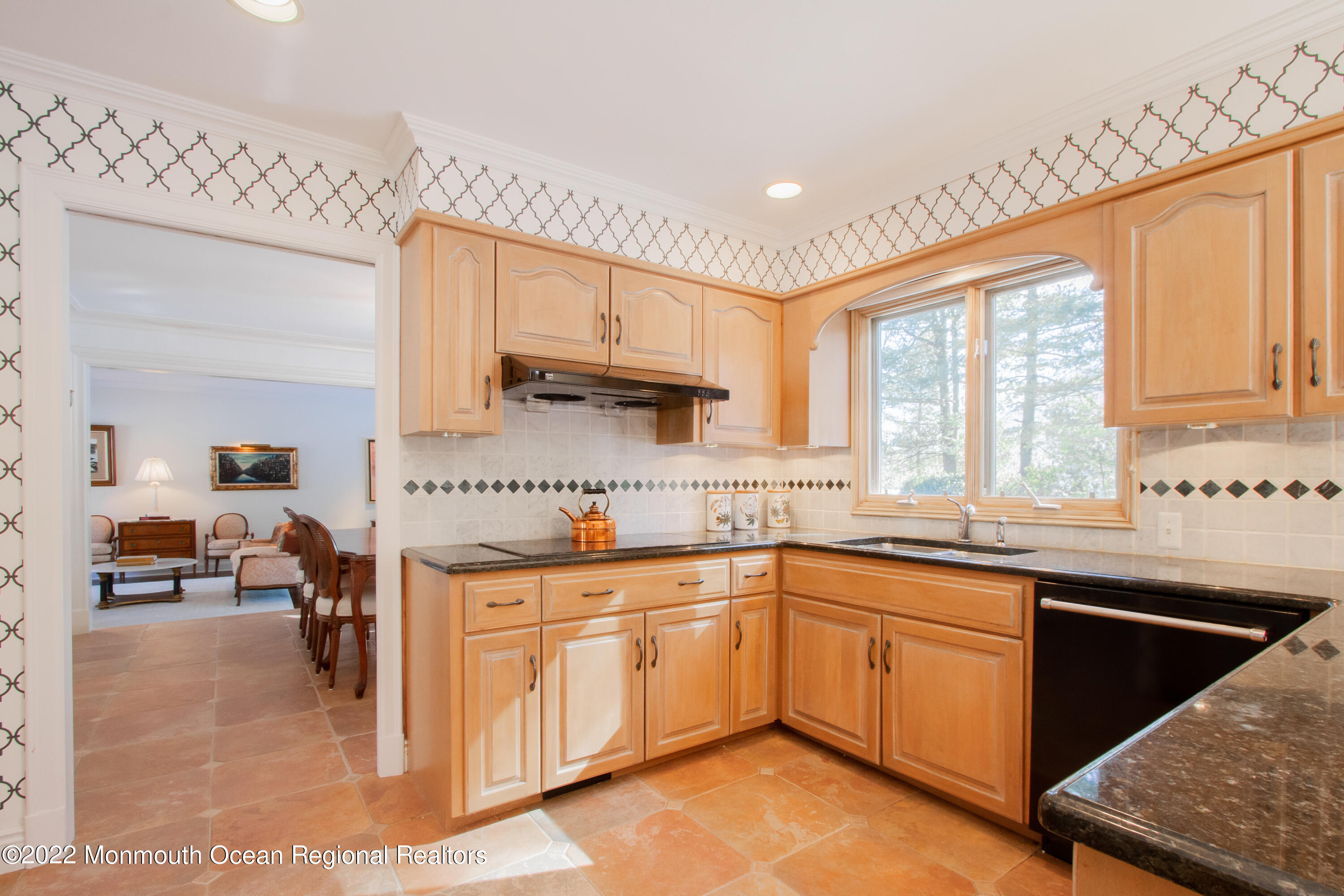 2 Woods End Road Rumson, NJ 07760 - Photo 8 of 35 a kitchen with a sink stove and cabinets