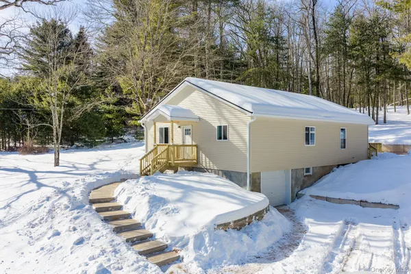 a view of a house with snow