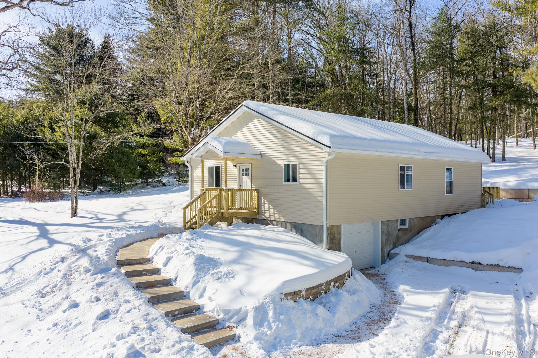 a view of a house with snow