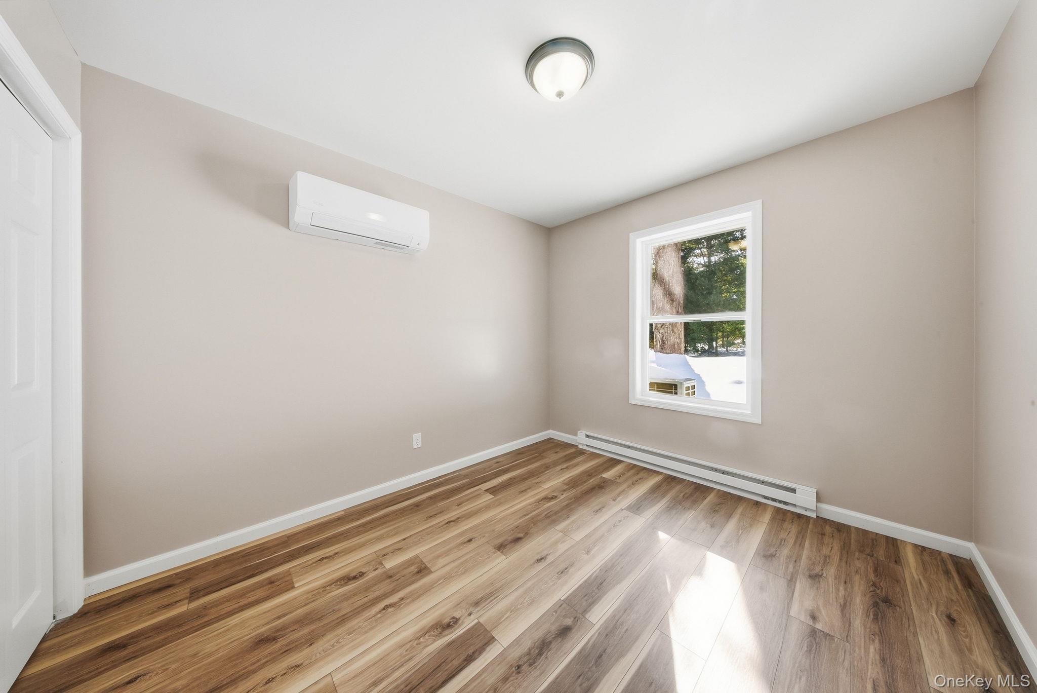 943 State Rte 55 Eldred, NY 12732 - Photo 14 of 33 an empty room with a window