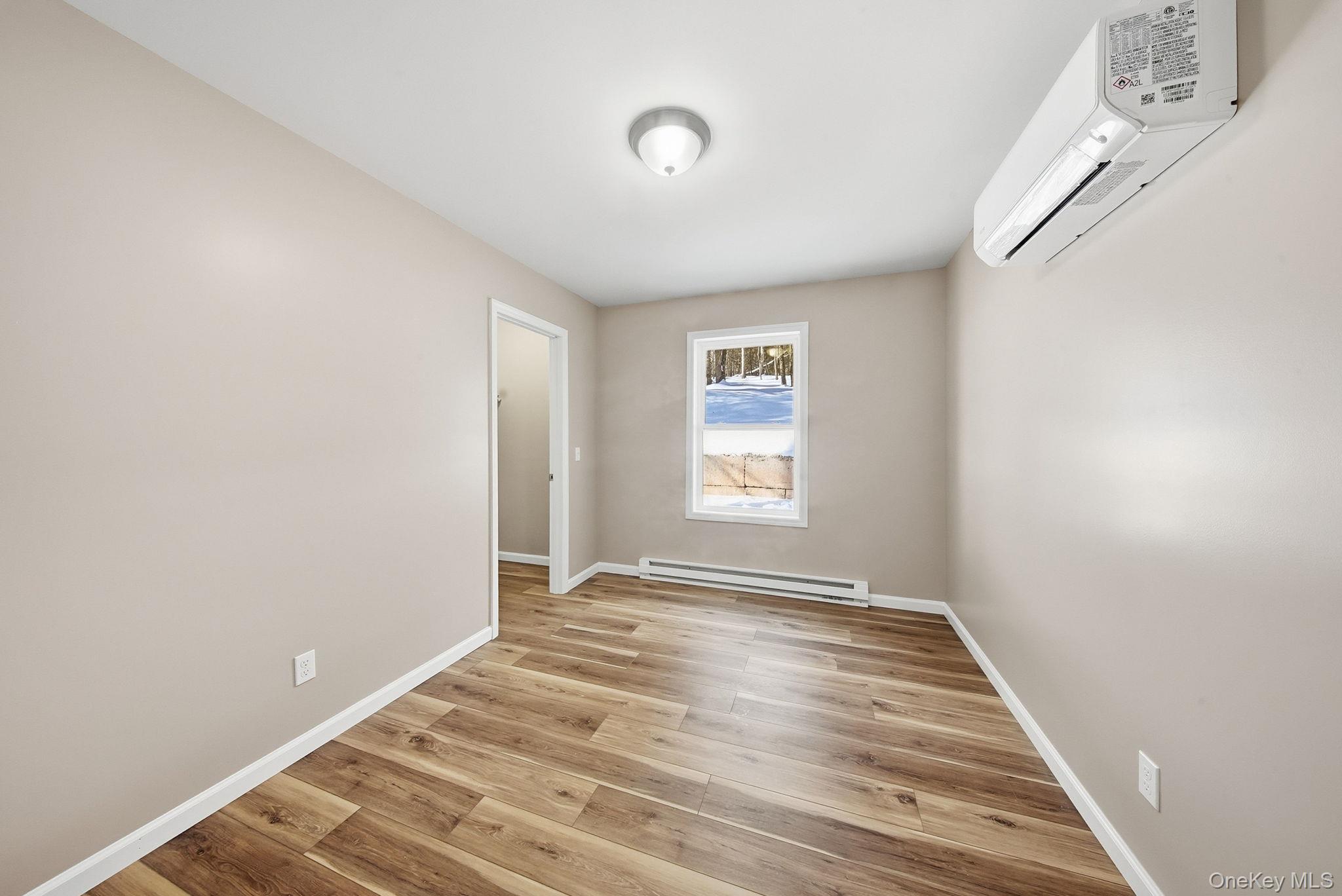943 State Rte 55 Eldred, NY 12732 - Photo 18 of 33 a view of an empty room with a window