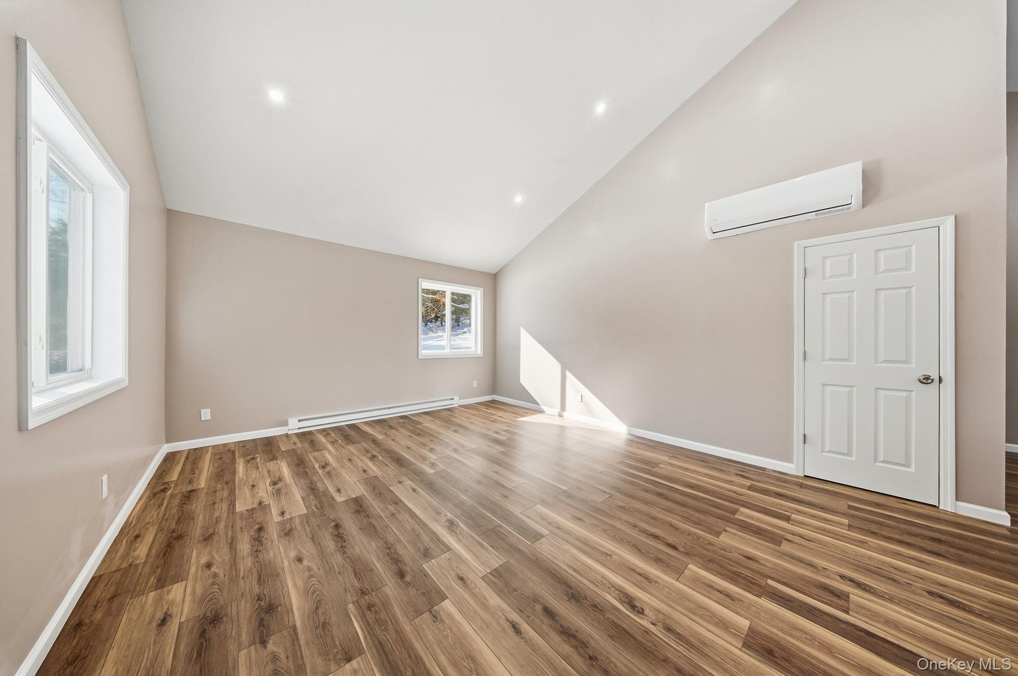 943 State Rte 55 Eldred, NY 12732 - Photo 5 of 33 wooden floor in an empty room with a window