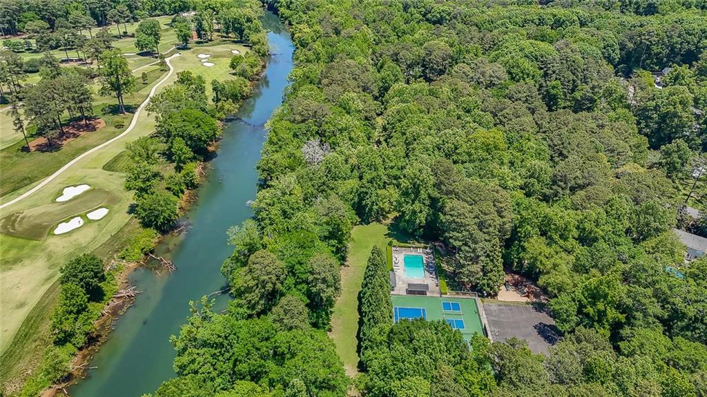 3712 Frederica Road Northwest Berkeley Lake, GA 30096 - Photo 45 of 49 an aerial view of residential house with outdoor space and trees all around
