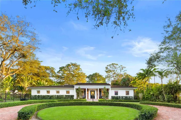 a view of a big yard next to a yard