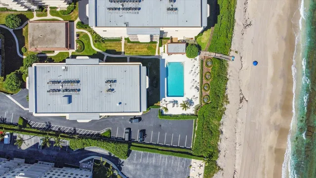 a view of building with outdoor space and river