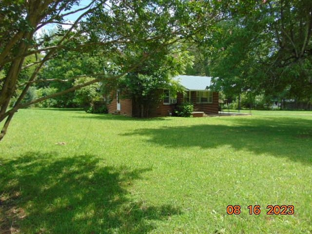 829 Beacon Road Parsons, TN 38363 - Photo 6 of 14 a view of a golf course with a garden