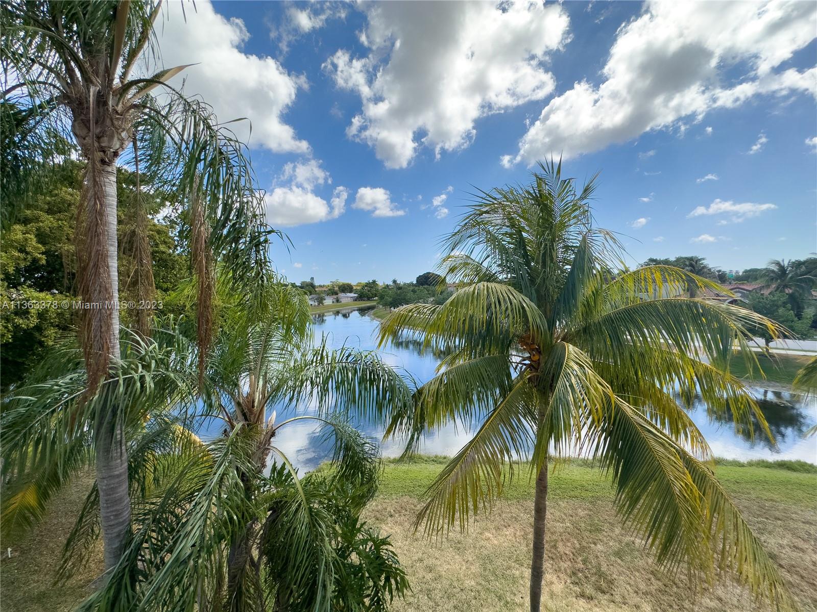 5654 Rock Island Road, Unit 234 Tamarac, FL 33319 - Photo 7 of 10 a view of a lake