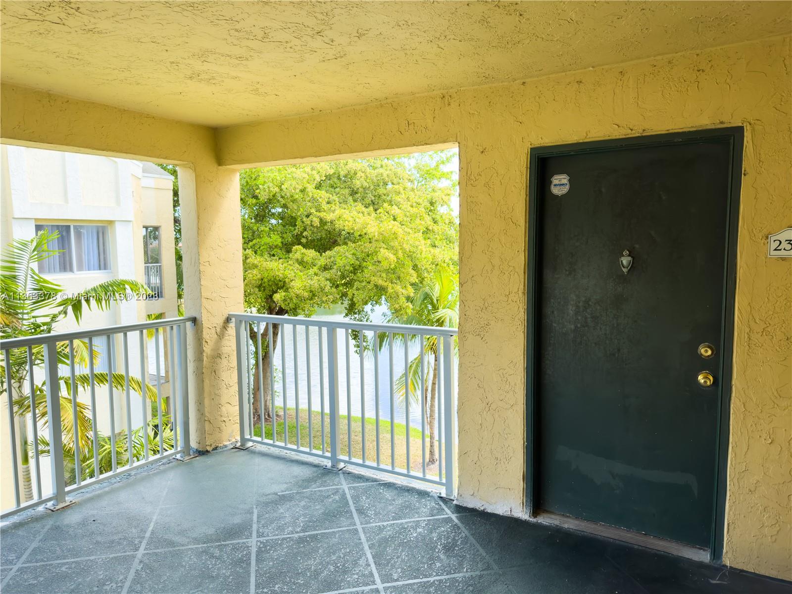 5654 Rock Island Road, Unit 234 Tamarac, FL 33319 - Photo 10 of 10 a view of a balcony