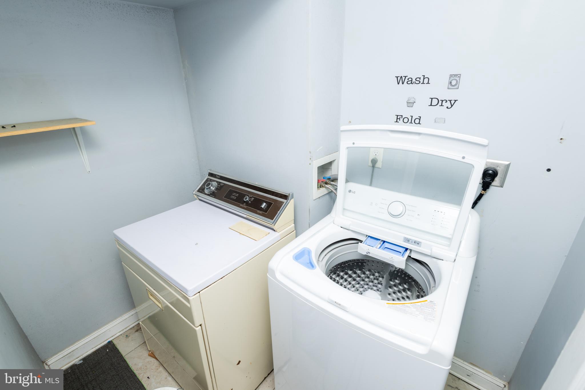 3201 Morrell Avenue, Unit 3 Philadelphia, PA 19114 - Photo 37 of 42 a utility room with dryer and washer