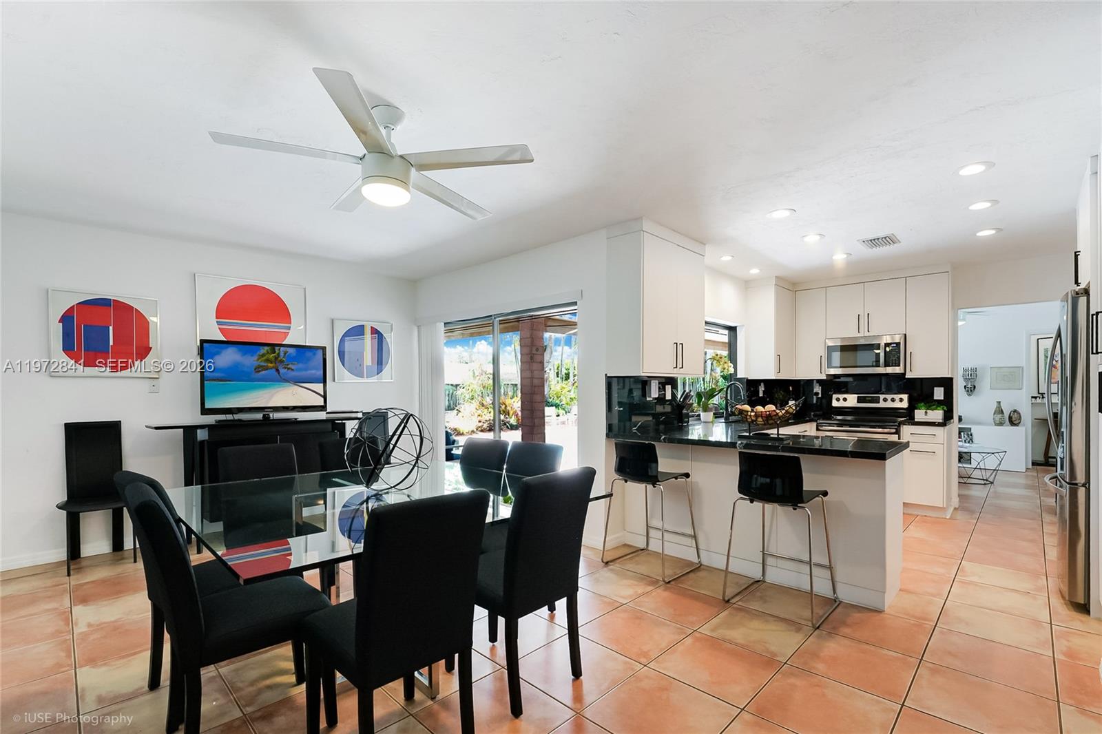 9860 Southwest 122nd Street Miami, FL 33176 - Photo 14 of 27 a view of a dining room with furniture