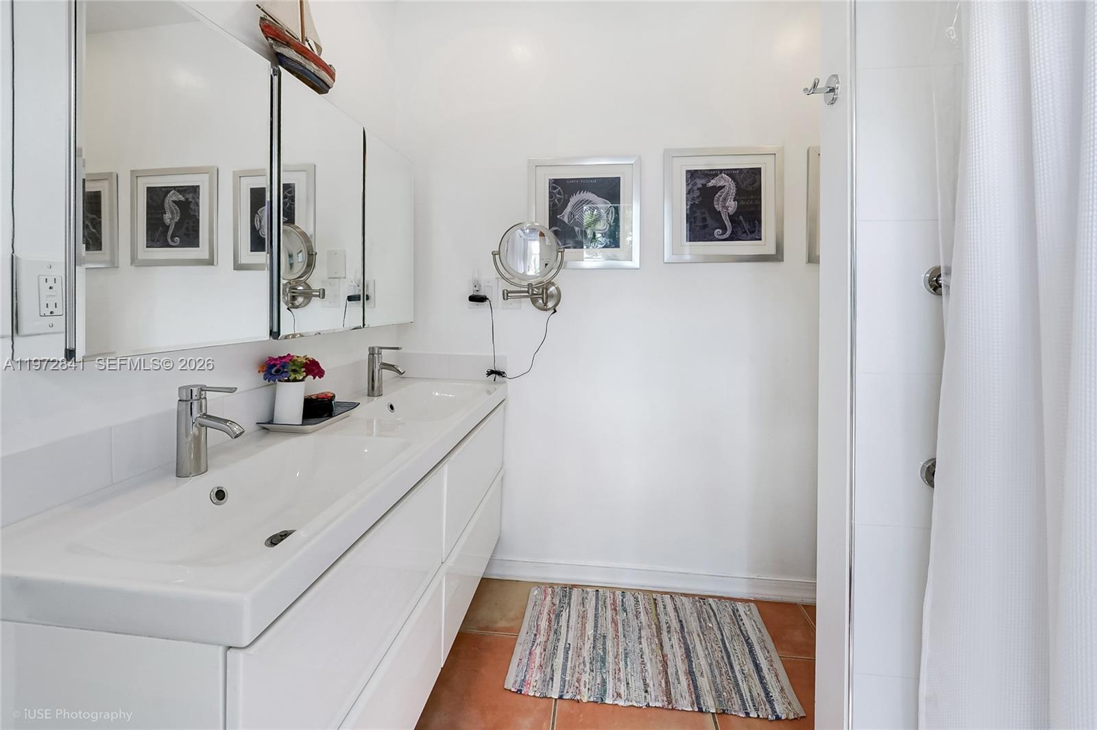 9860 Southwest 122nd Street Miami, FL 33176 - Photo 22 of 27 a bathroom with a sink and mirror