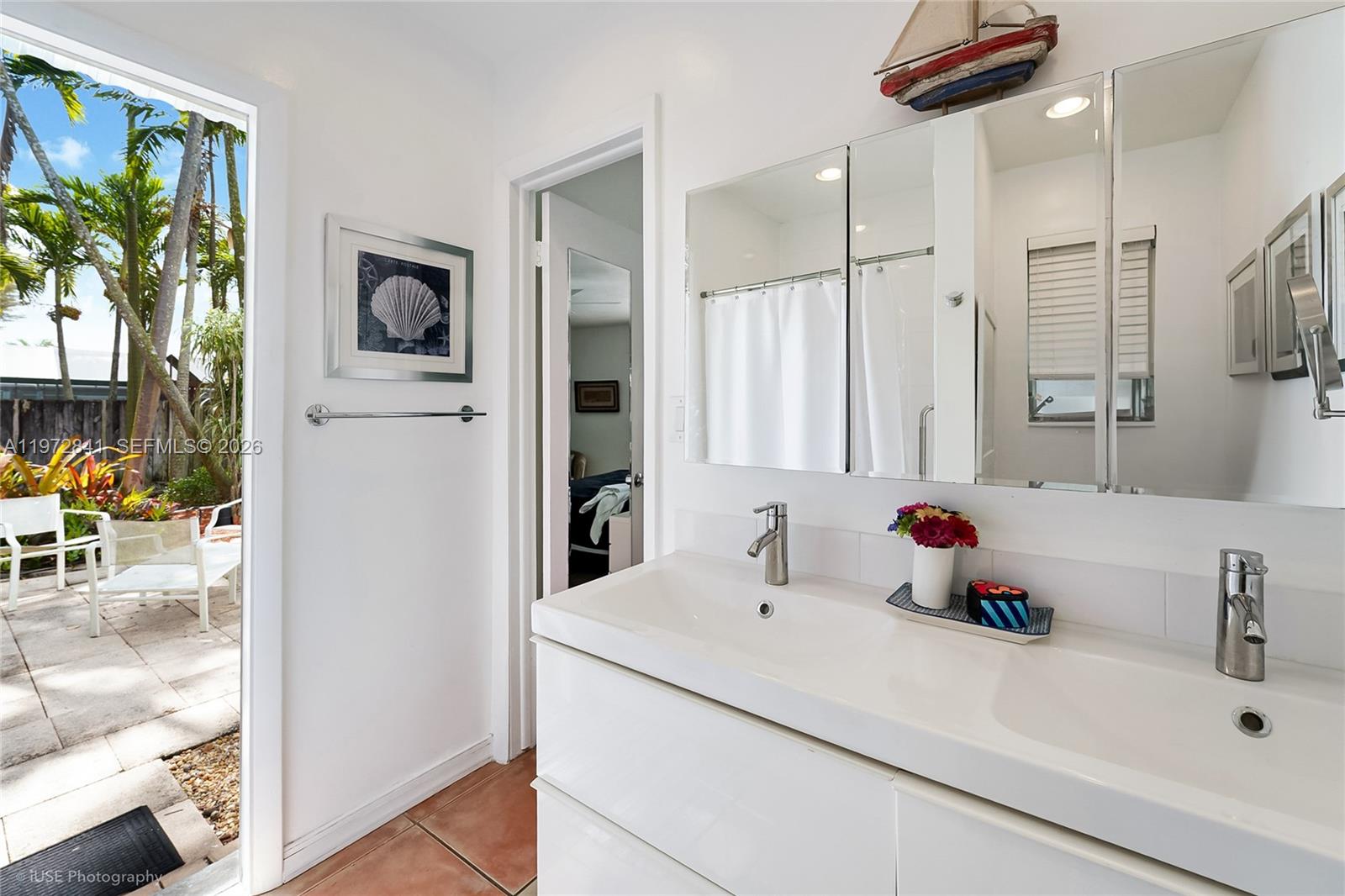9860 Southwest 122nd Street Miami, FL 33176 - Photo 23 of 27 a bathroom with a sink and a mirror