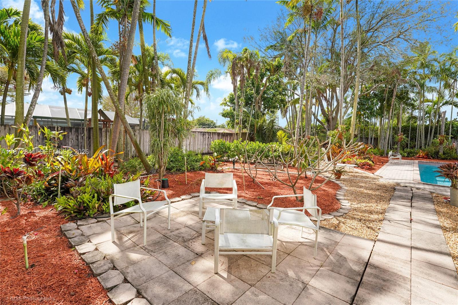 9860 Southwest 122nd Street Miami, FL 33176 - Photo 24 of 27 a view of patio with chairs and tables