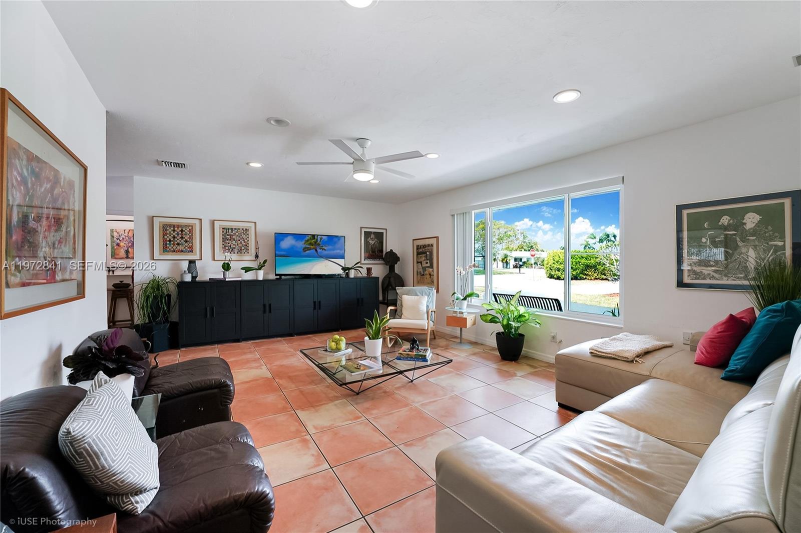 9860 Southwest 122nd Street Miami, FL 33176 - Photo 5 of 27 a living room with furniture and a window