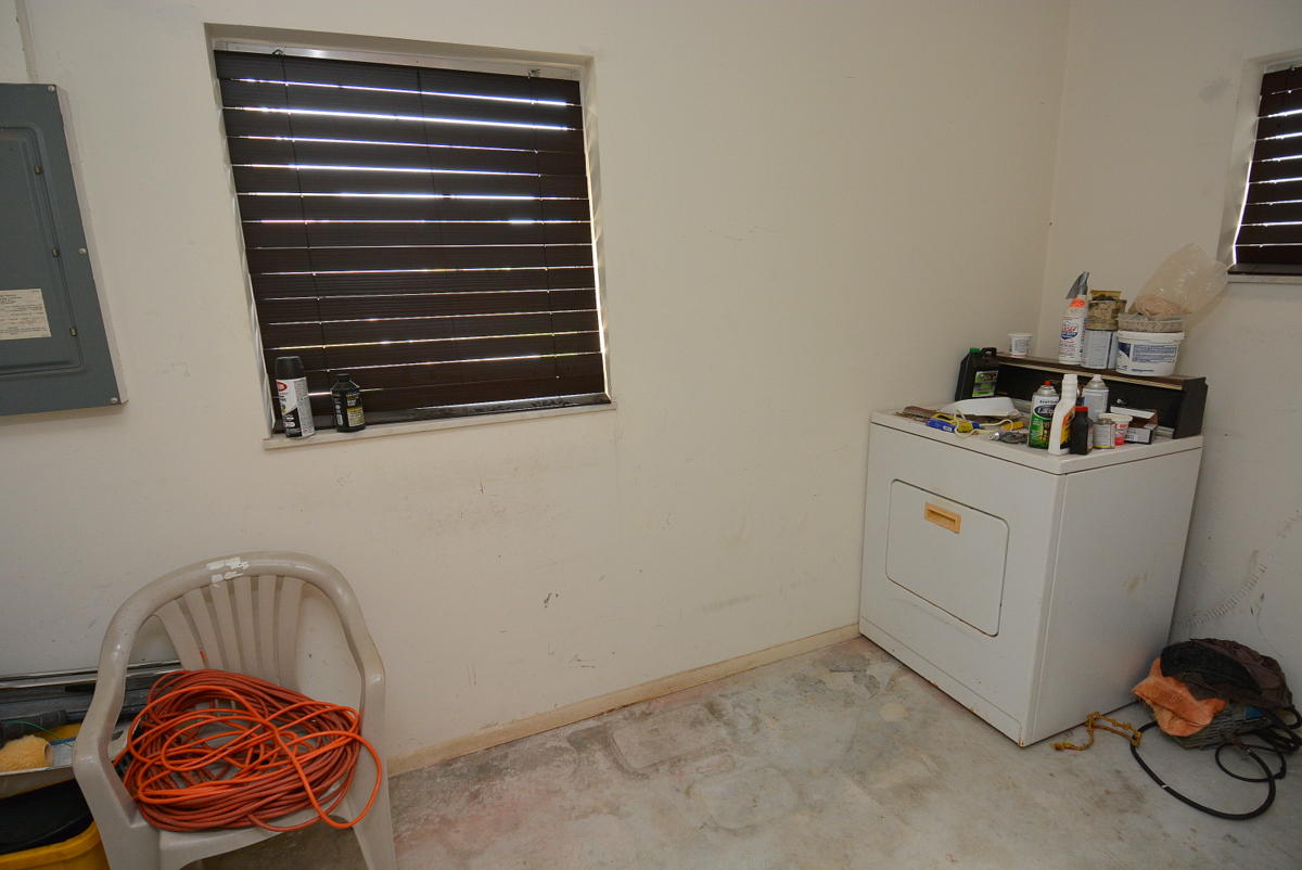 7006 Kenwood Road Fort Pierce, FL 34951 - Photo 54 of 55 54 garage laundry
