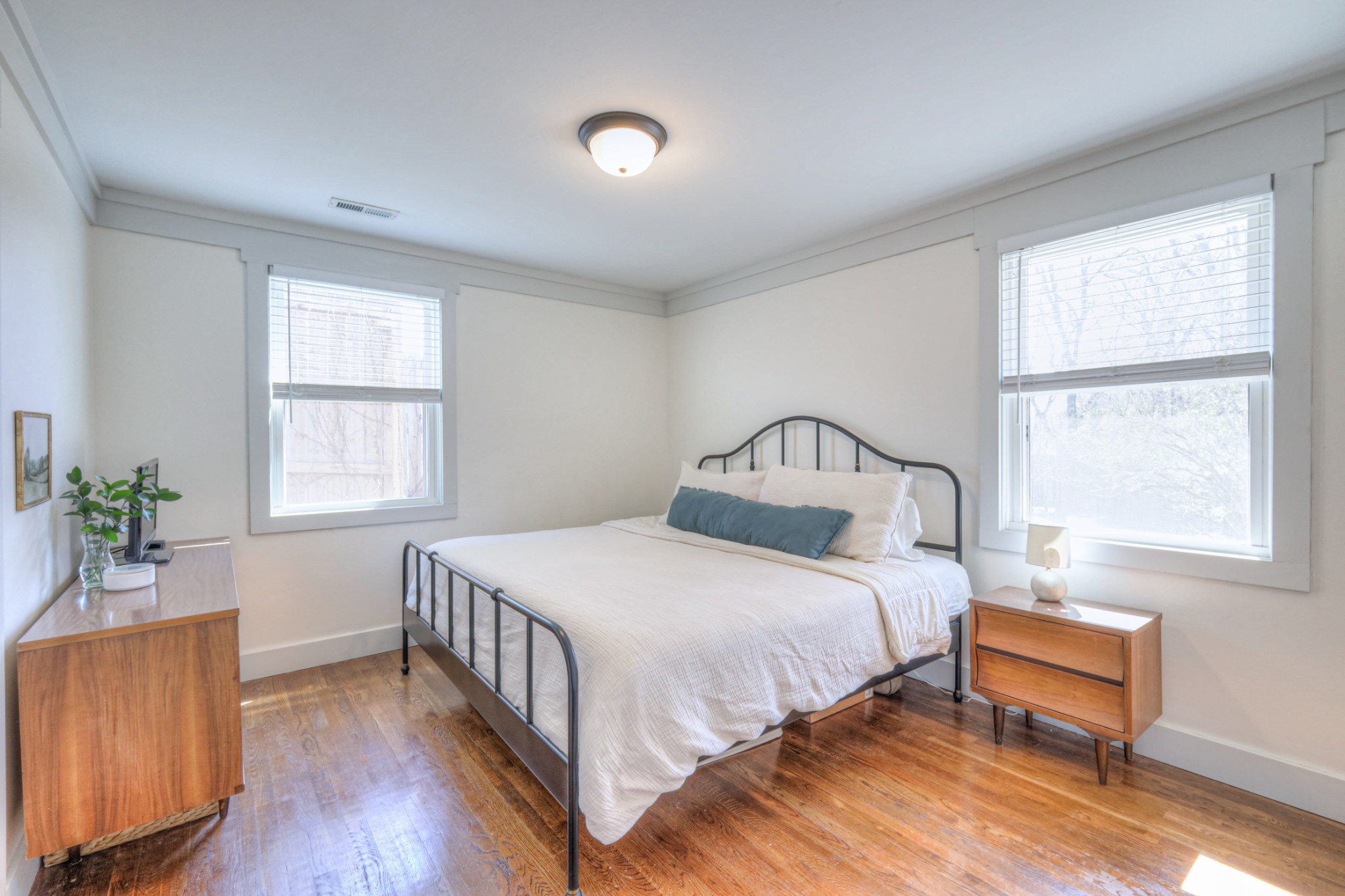 691 Harding Place Nashville, TN 37211 - Photo 11 of 54 a bedroom with a bed and windows