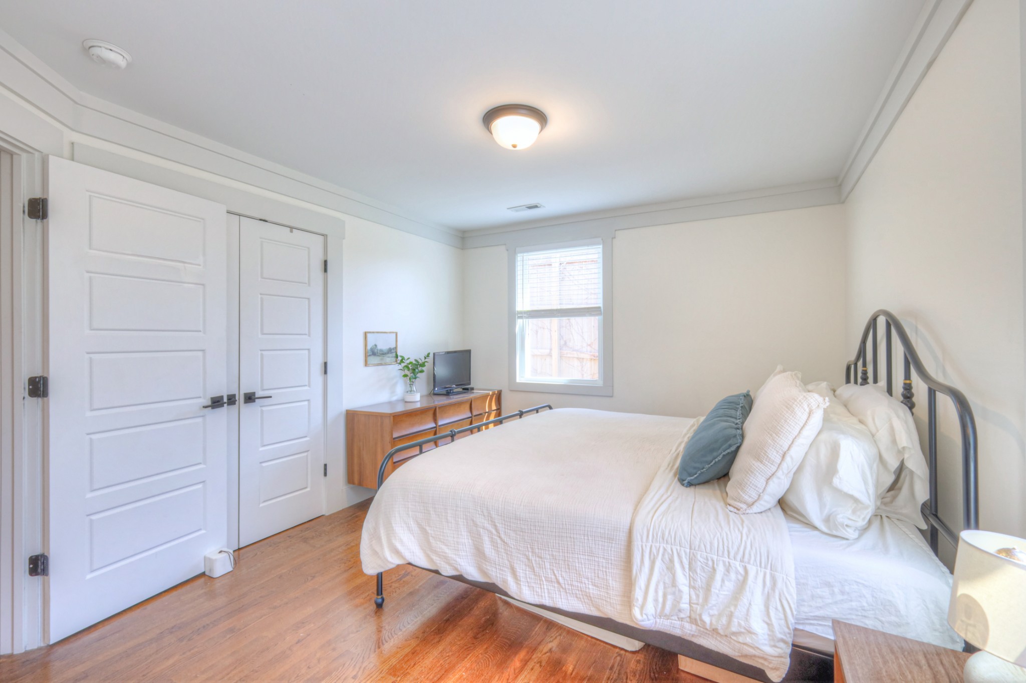 691 Harding Place Nashville, TN 37211 - Photo 13 of 54 a bedroom with a bed and a window