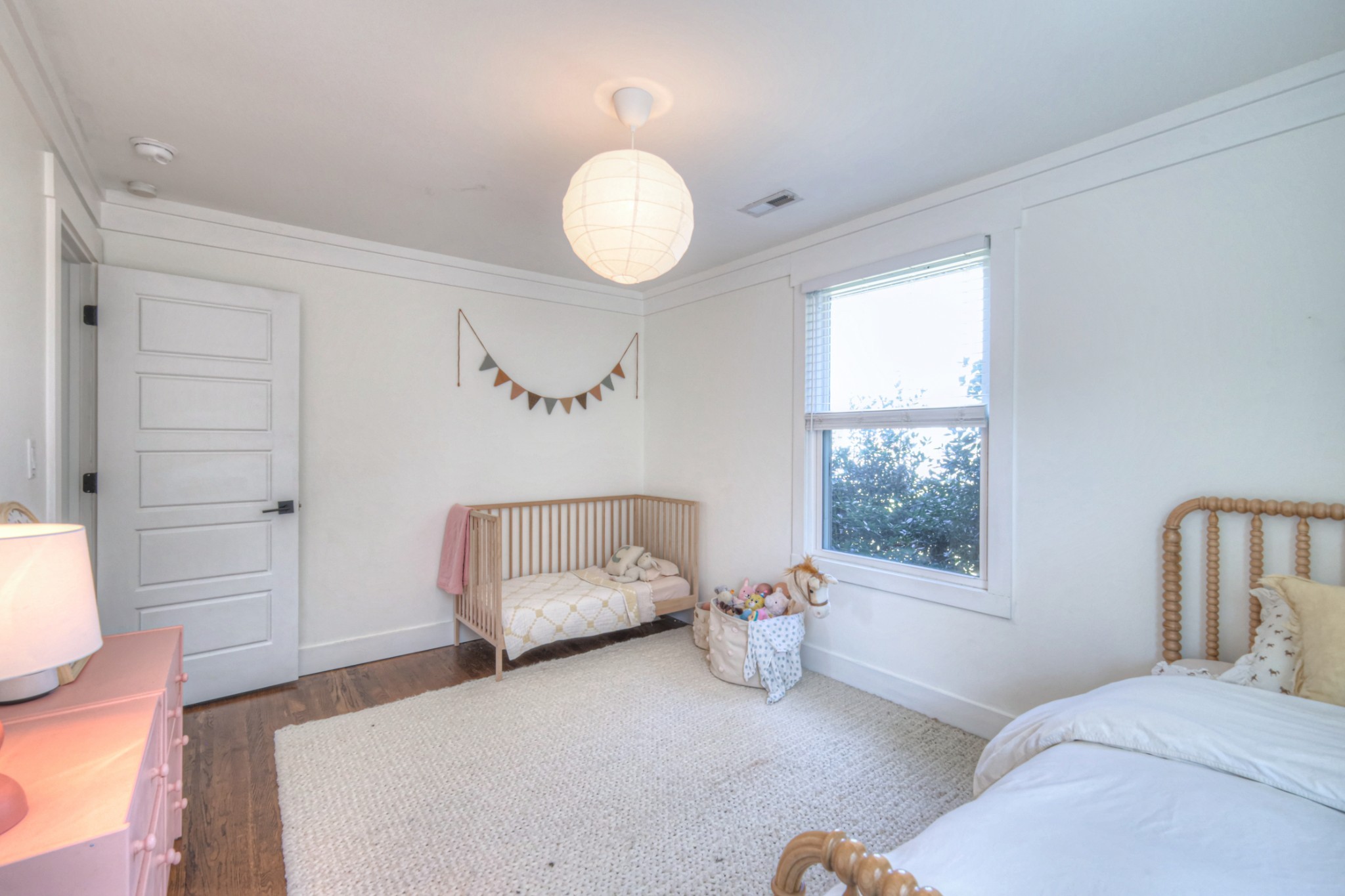 691 Harding Place Nashville, TN 37211 - Photo 16 of 54 a bedroom with a bed and a window