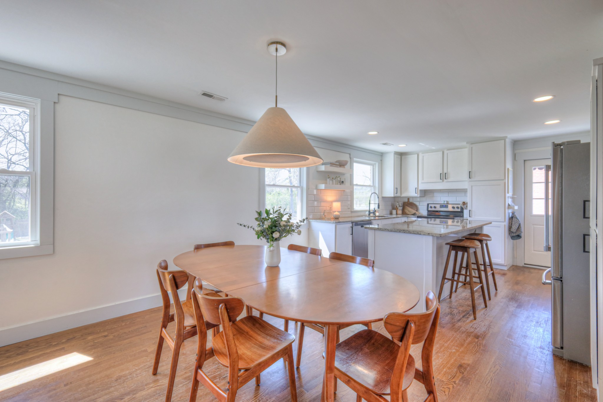 691 Harding Place Nashville, TN 37211 - Photo 20 of 54 a view of a dining room with furniture and wooden floor