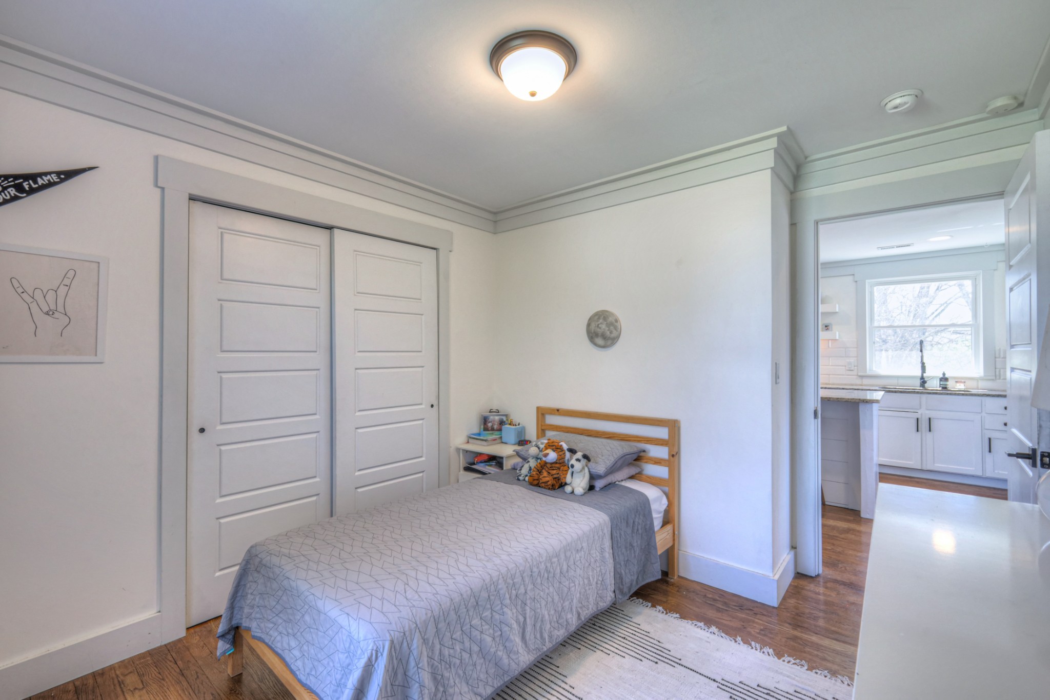 691 Harding Place Nashville, TN 37211 - Photo 30 of 54 a bedroom with a bed and hallway