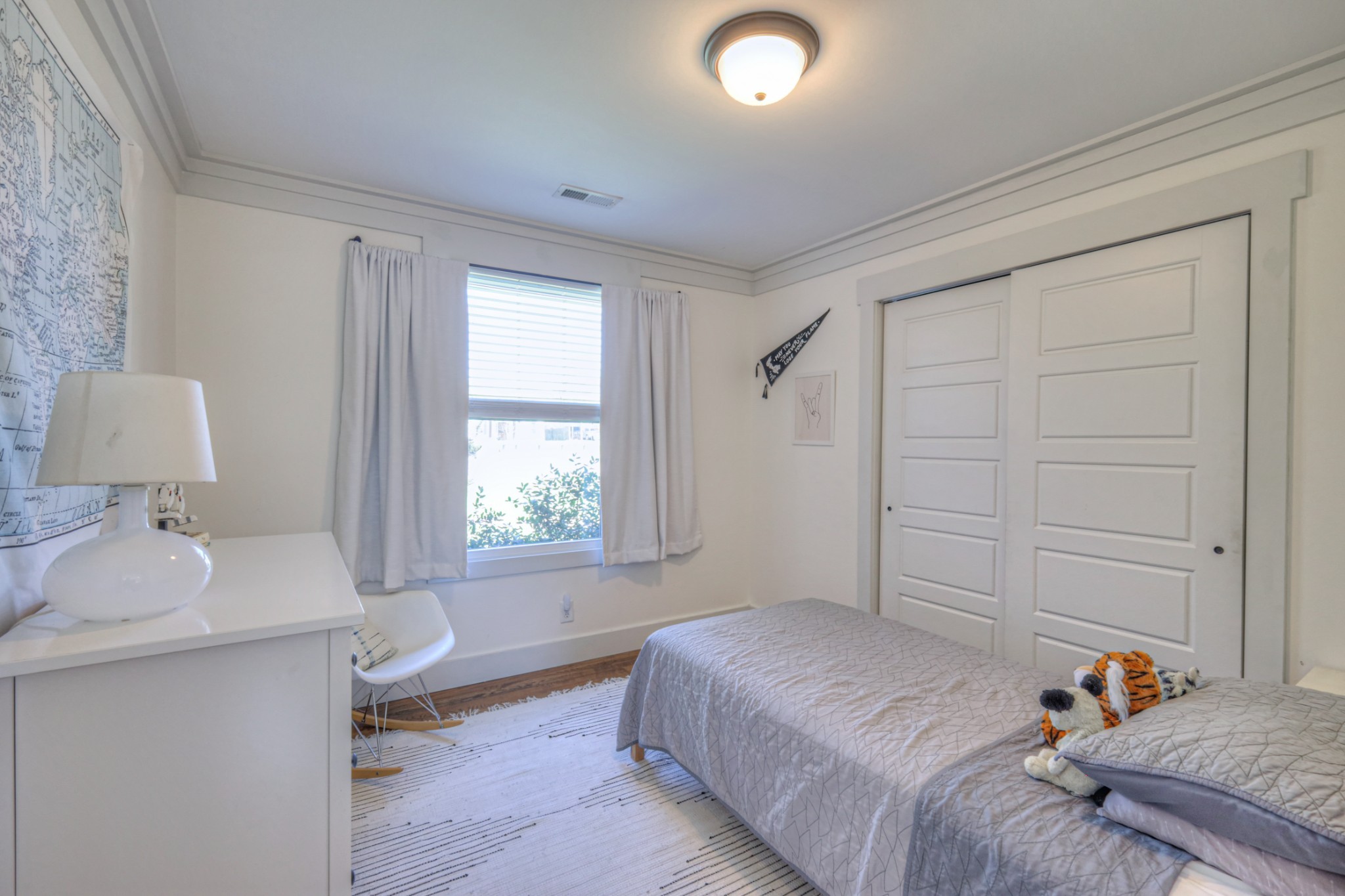 691 Harding Place Nashville, TN 37211 - Photo 31 of 54 a bedroom with a bed and a window