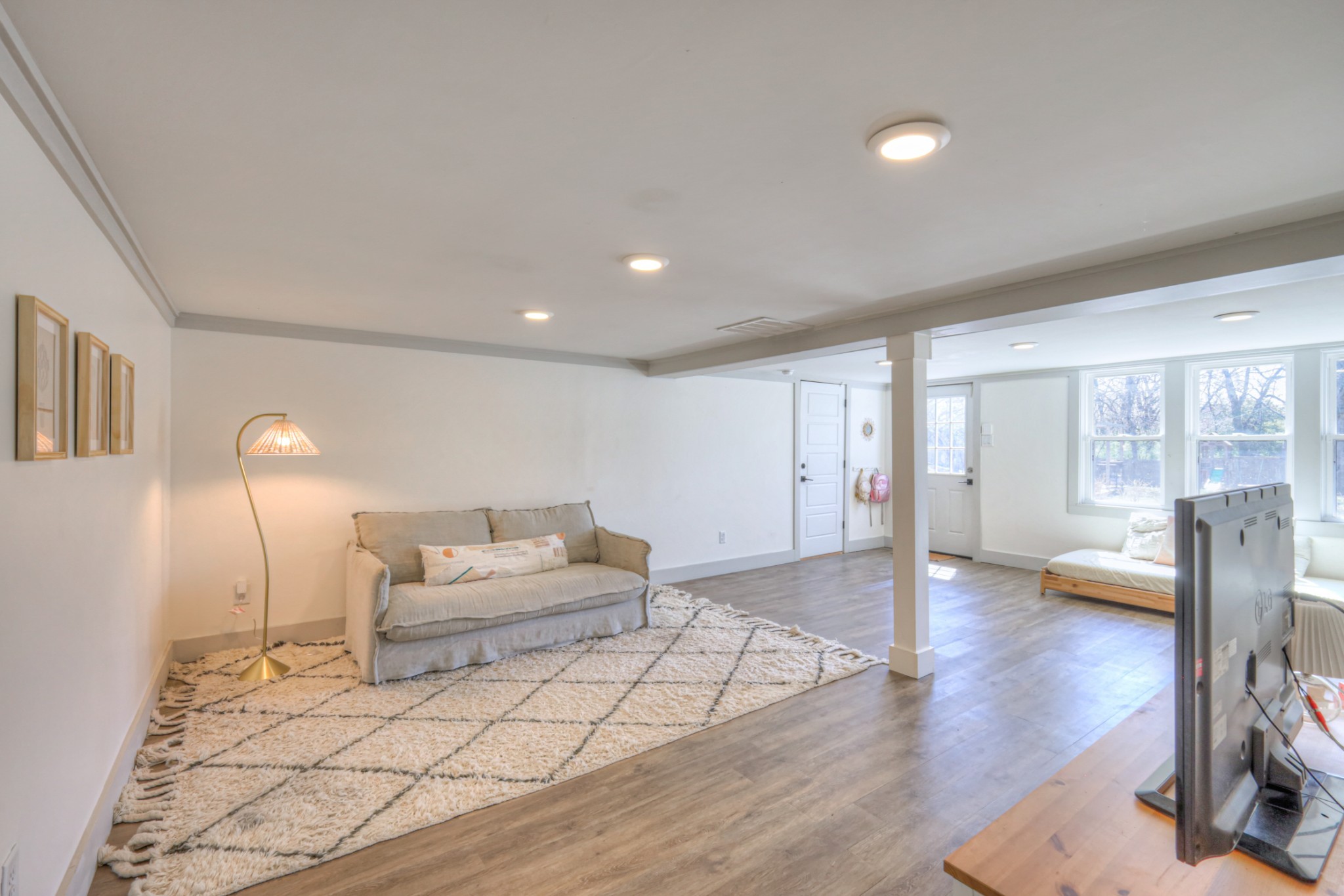 691 Harding Place Nashville, TN 37211 - Photo 33 of 54 a living room with furniture and a wooden floor