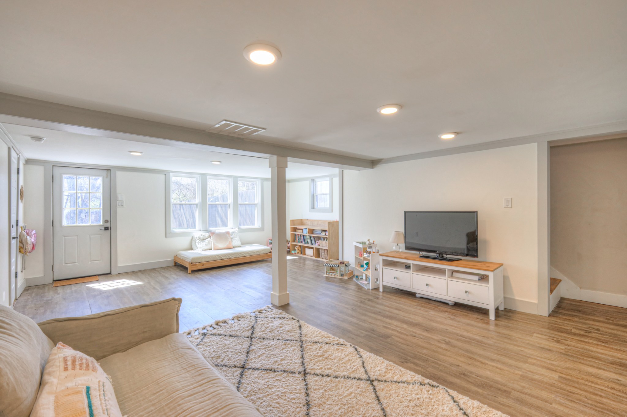 691 Harding Place Nashville, TN 37211 - Photo 34 of 54 a living room with furniture and a flat screen tv