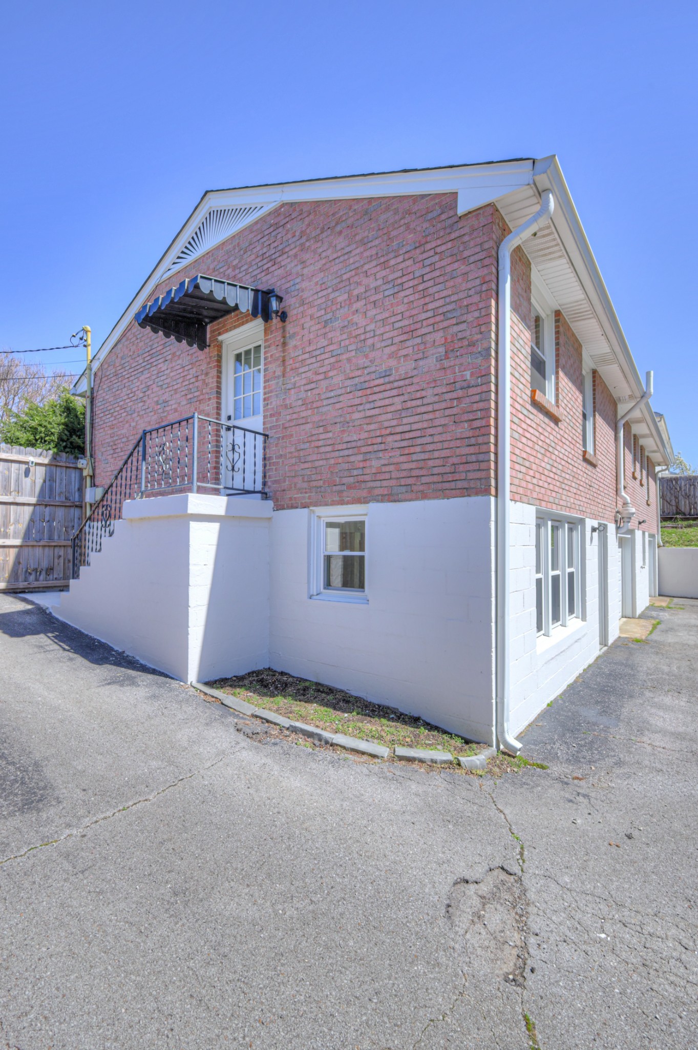 691 Harding Place Nashville, TN 37211 - Photo 51 of 54 front view of a house with a street