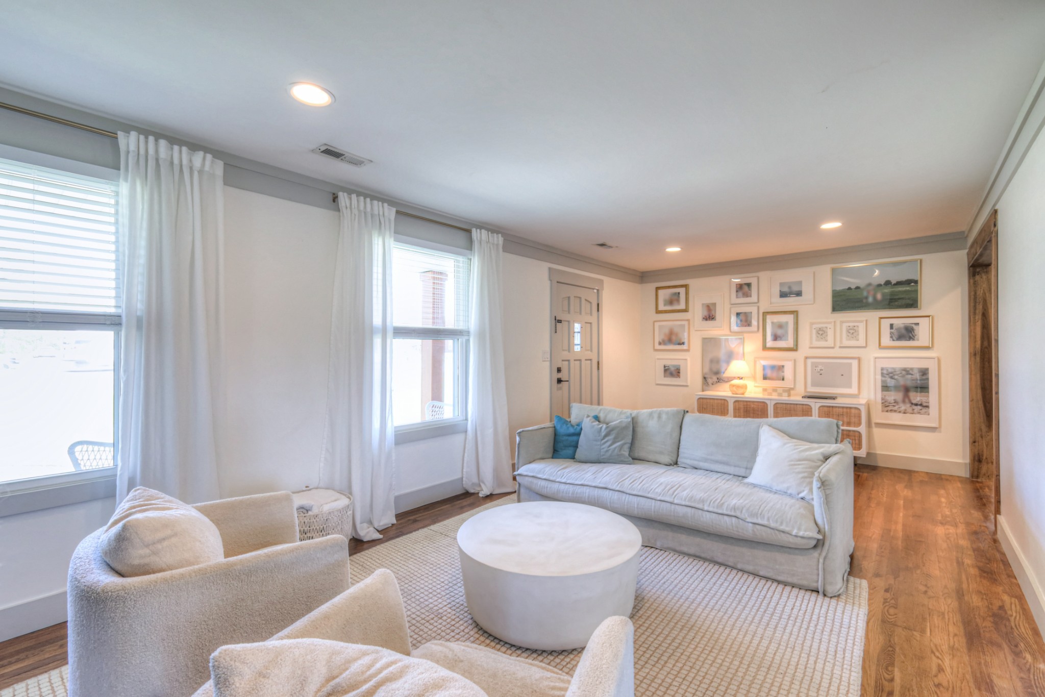 691 Harding Place Nashville, TN 37211 - Photo 9 of 54 a living room with furniture and a wooden floor