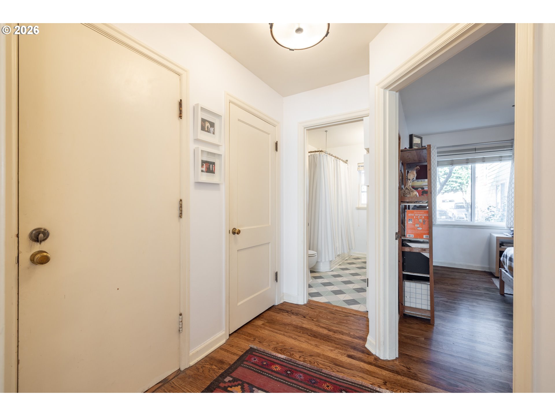 2123 Northeast Clackamas Street, Unit 5 Portland, OR 97232 - Photo 19 of 31 a view of an empty room and wooden floor