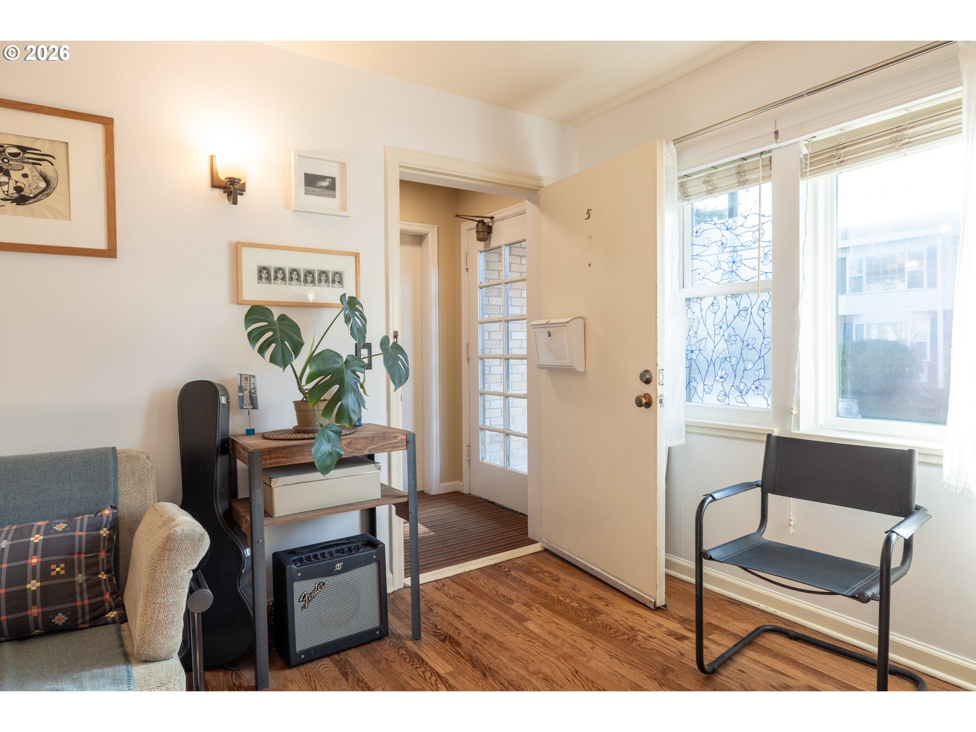 2123 Northeast Clackamas Street, Unit 5 Portland, OR 97232 - Photo 5 of 31 a living room with furniture and a window