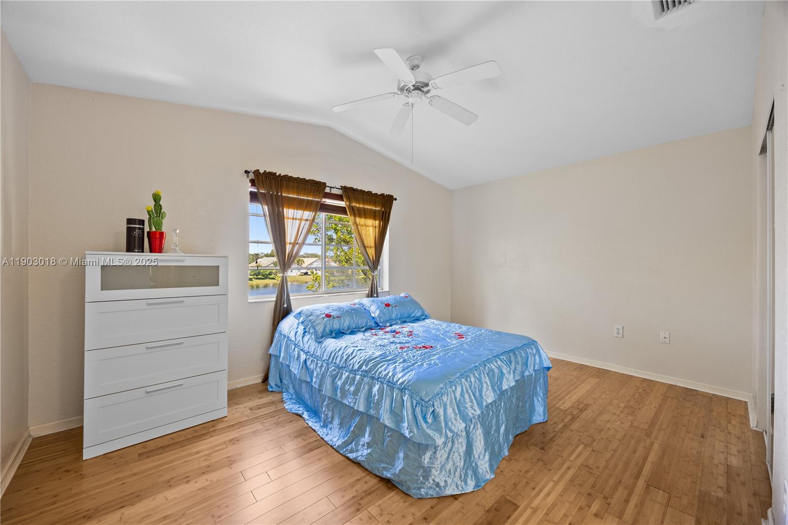 2658 Southwest 189th Avenue Miramar, FL 33029 - Photo 20 of 67 a bedroom with a bed and a dresser