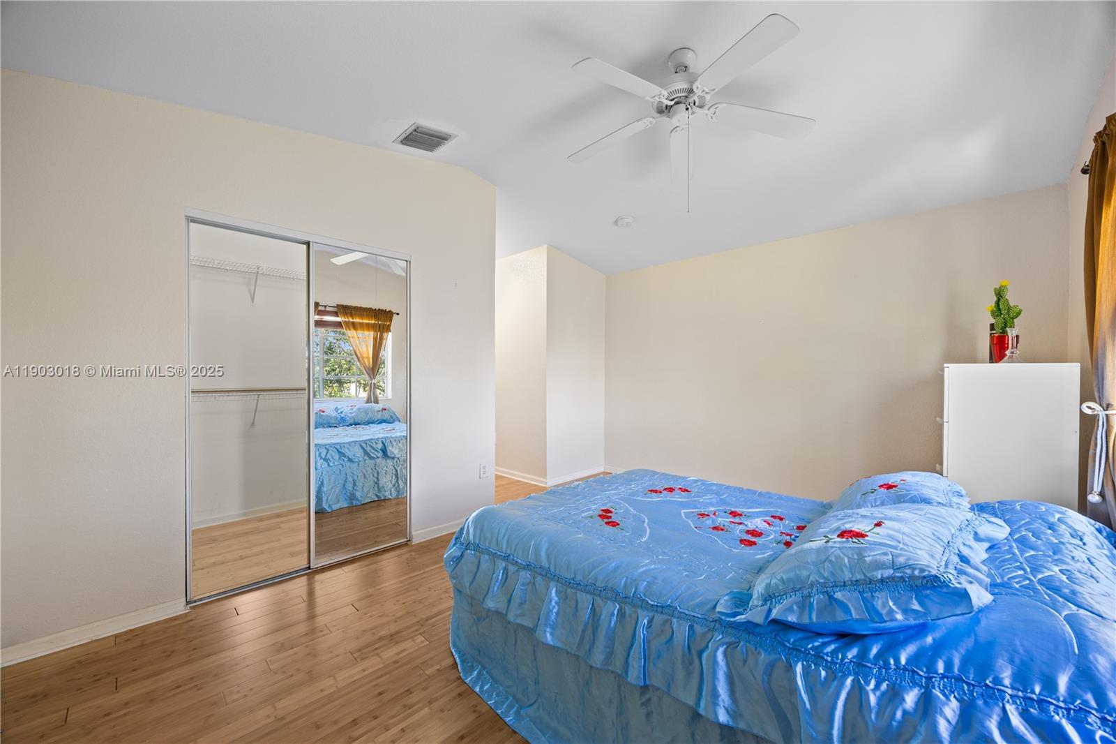 2658 Southwest 189th Avenue Miramar, FL 33029 - Photo 22 of 67 a bedroom with a bed and a chandelier