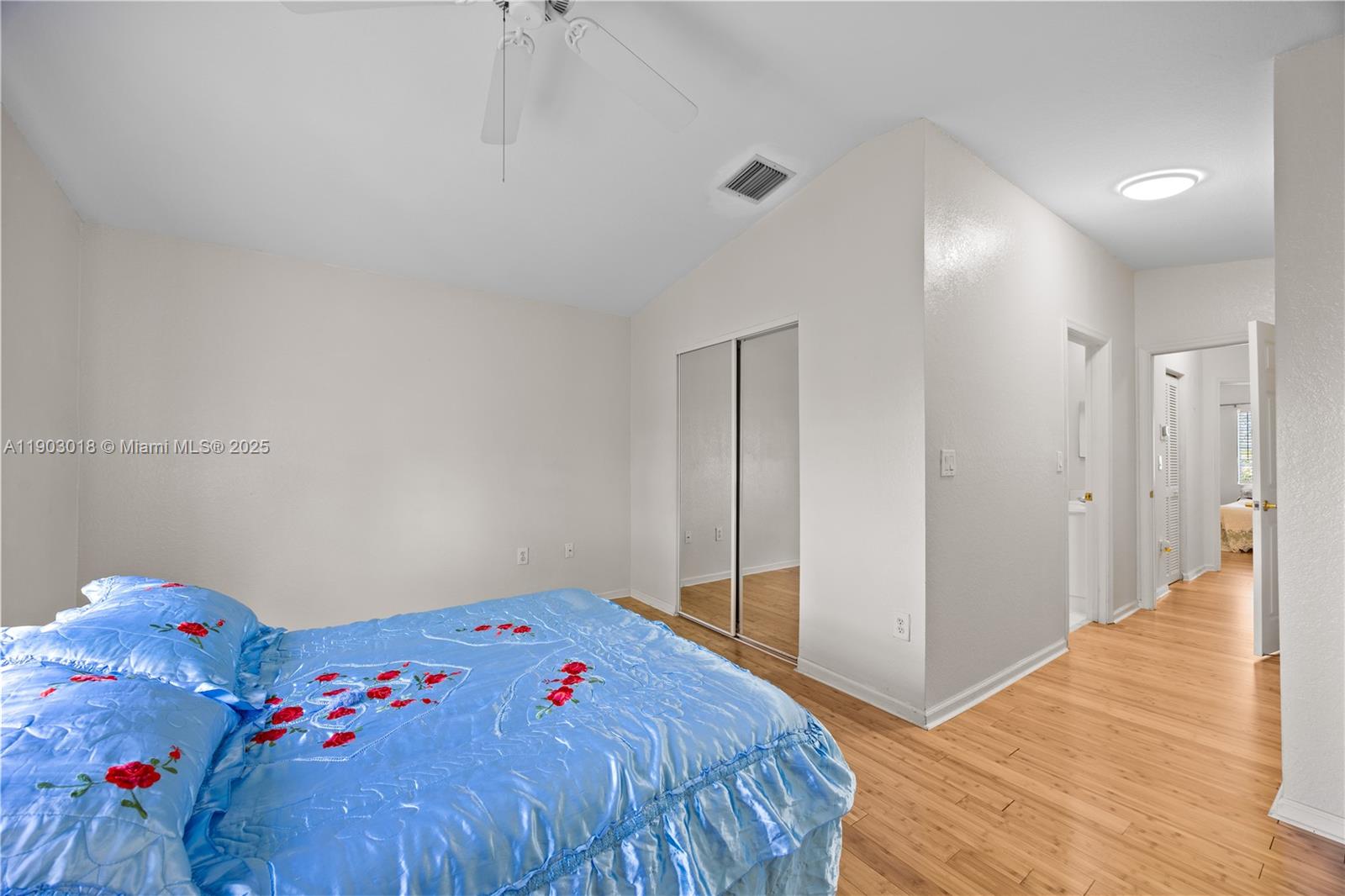 2658 Southwest 189th Avenue Miramar, FL 33029 - Photo 23 of 67 a bedroom with a bed and wooden floor