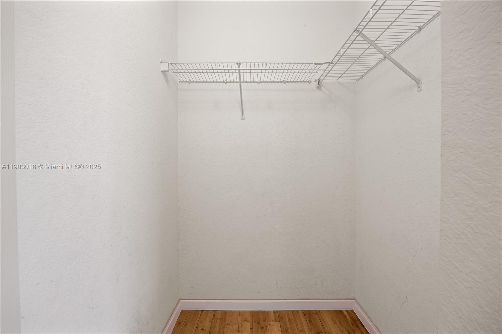 2658 Southwest 189th Avenue Miramar, FL 33029 - Photo 26 of 67 a view of a room with racks on the wall