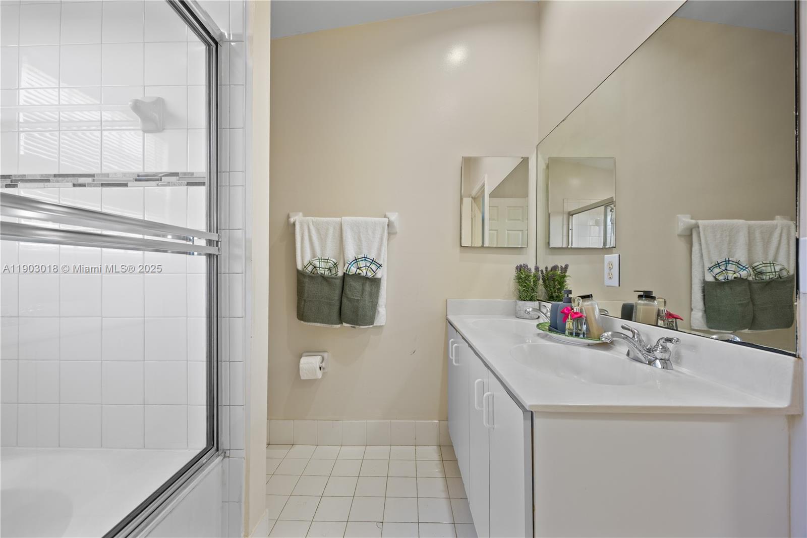2658 Southwest 189th Avenue Miramar, FL 33029 - Photo 28 of 67 a bathroom with a sink and a mirror