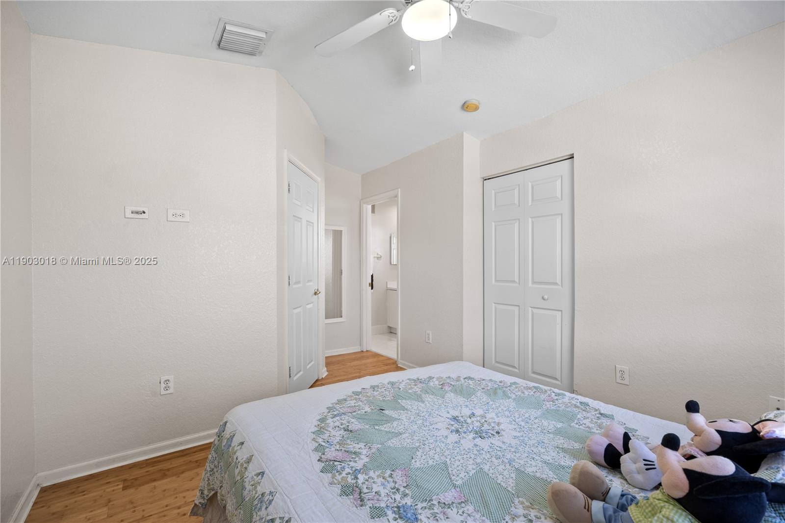2658 Southwest 189th Avenue Miramar, FL 33029 - Photo 30 of 67 a bedroom with a bed and hallway