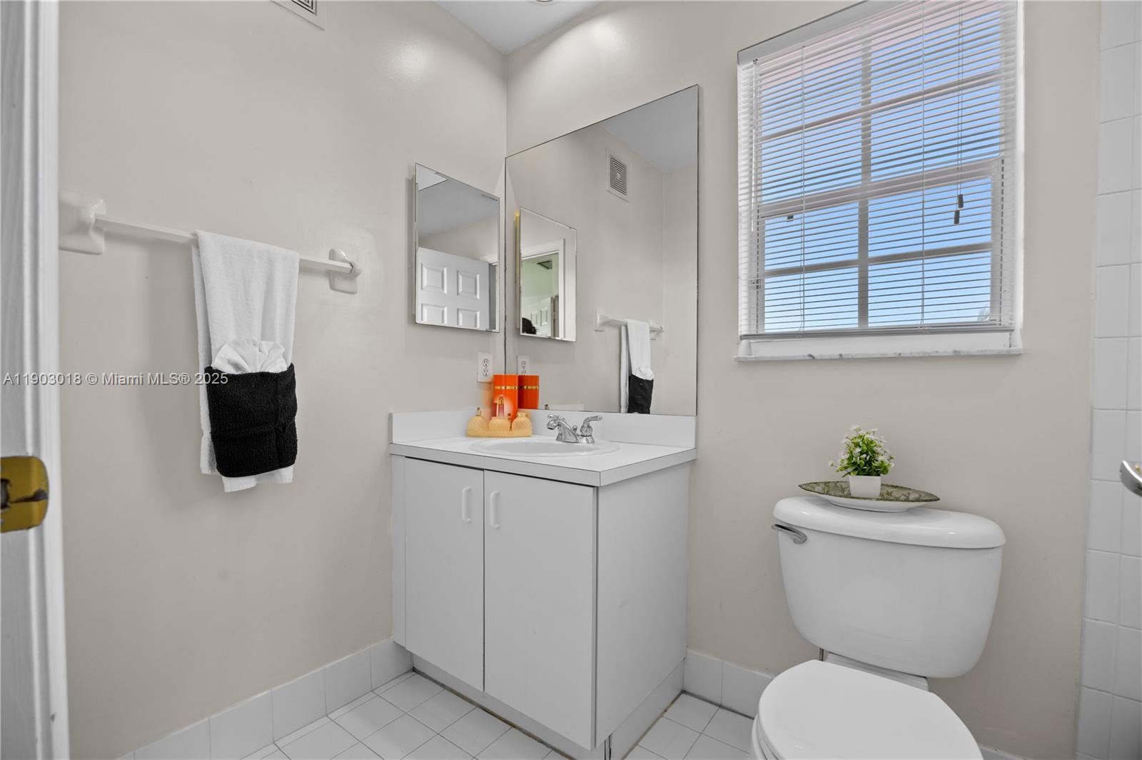 2658 Southwest 189th Avenue Miramar, FL 33029 - Photo 32 of 67 a bathroom with a sink toilet and shower