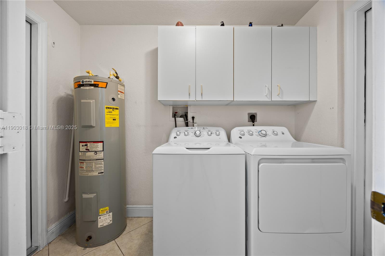 2658 Southwest 189th Avenue Miramar, FL 33029 - Photo 39 of 67 a utility room with dryer and washer