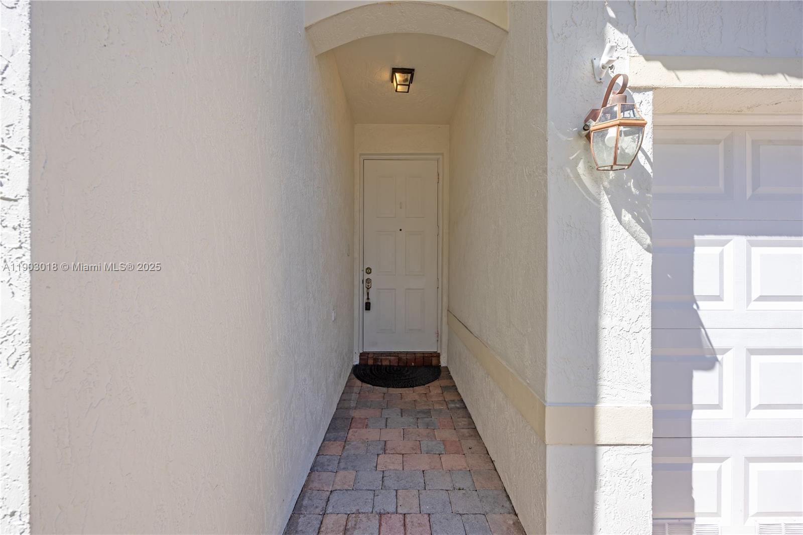 2658 Southwest 189th Avenue Miramar, FL 33029 - Photo 4 of 67 a view of a hallway with wooden floor and a window