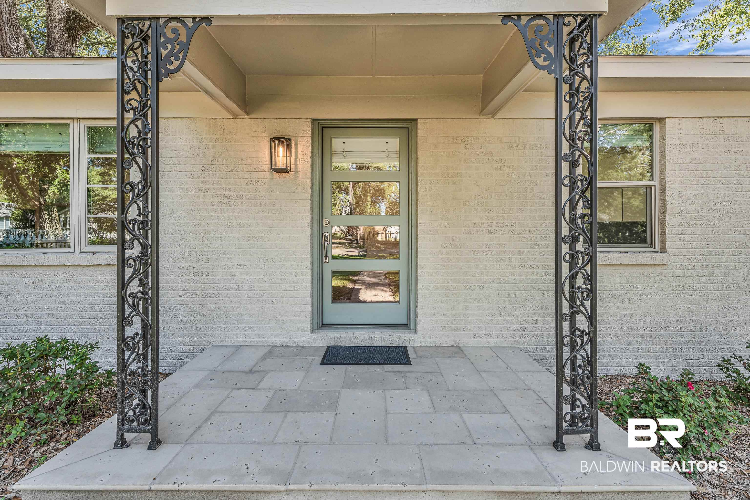 357 Azalea Street Fairhope, AL 36532 - Photo 17 of 22 Entrance to property with brick siding and a porch
