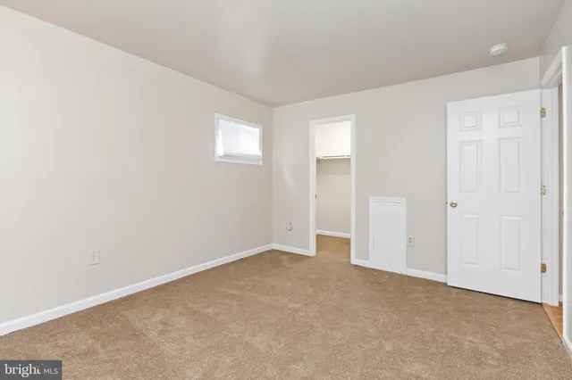 an empty room with an entryway