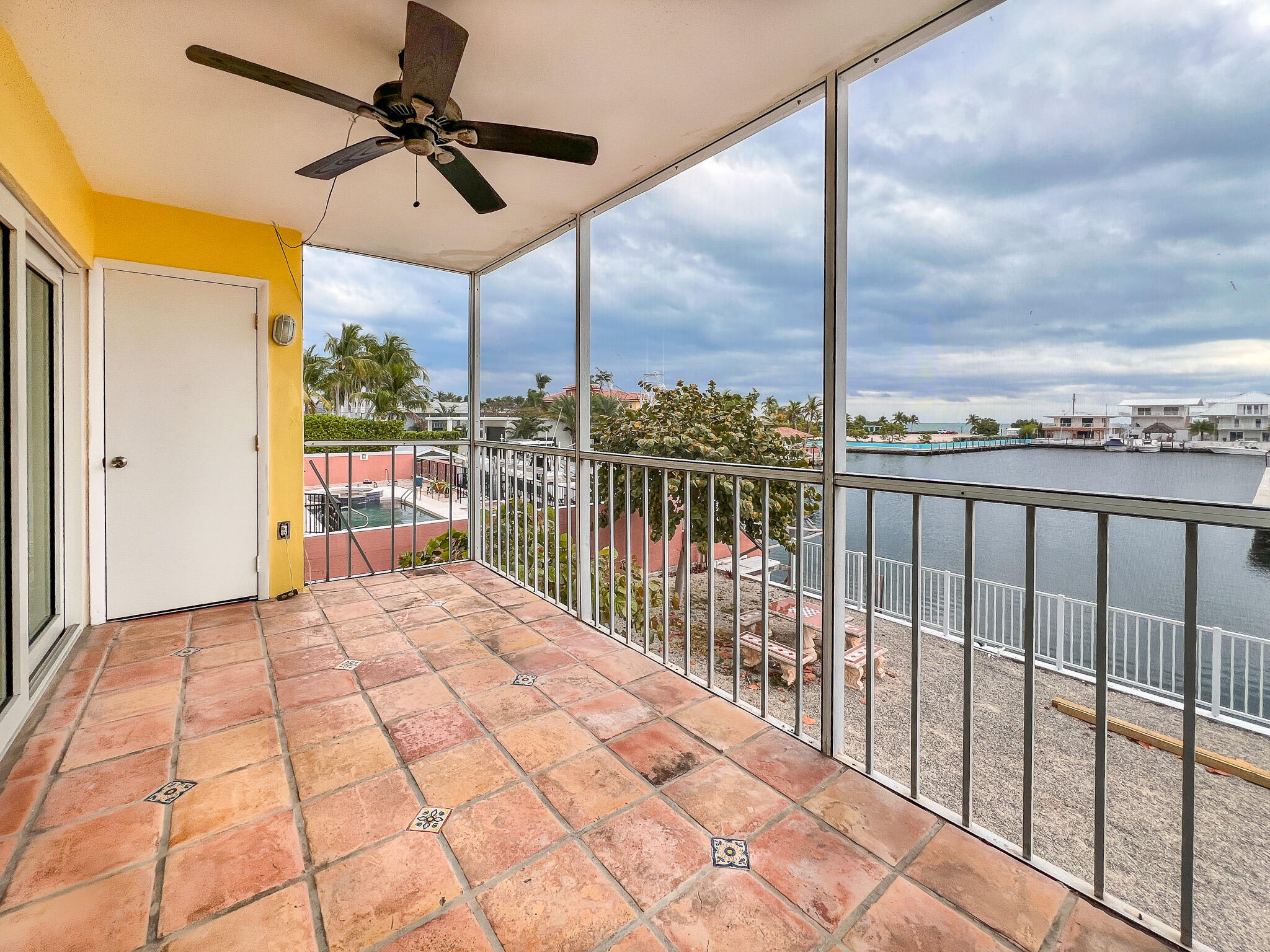 188 Atlantic Boulevard, Unit B Key Largo, FL 33037 - Photo 2 of 22 Screened in Patio with Storage